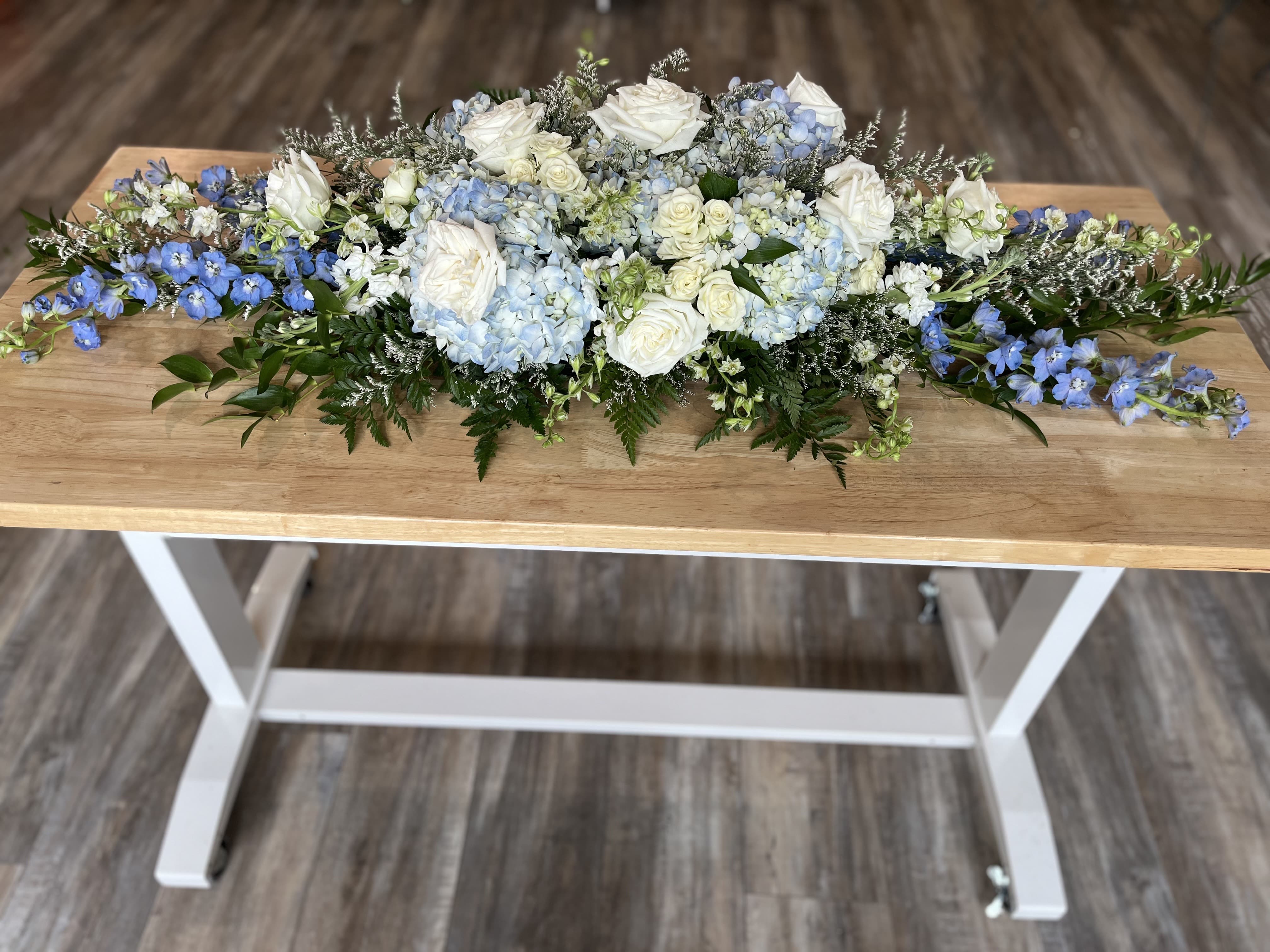 A table spray funeral arrangement